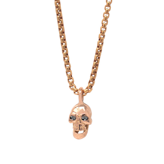 Mini 14k rose gold skull pendant with hand-set red garnet gem eyes - Best skull jewelry by Versani NY