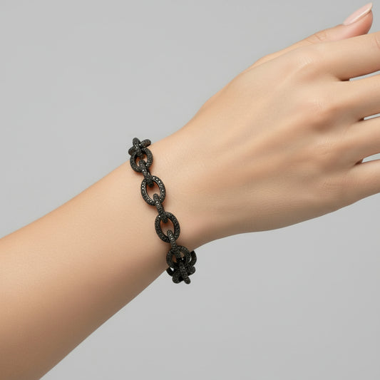 Black chain bracelet on a white background