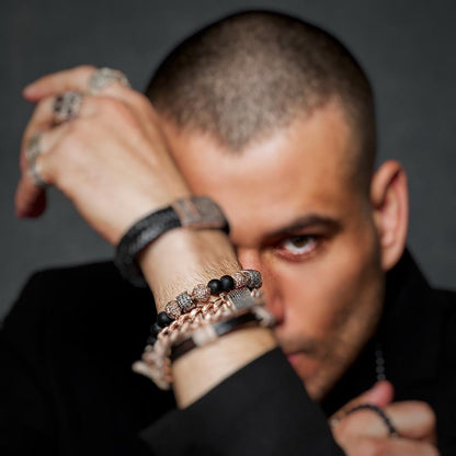 Beaded Bracelet With Gold Beads And Black Diamond Cylinders