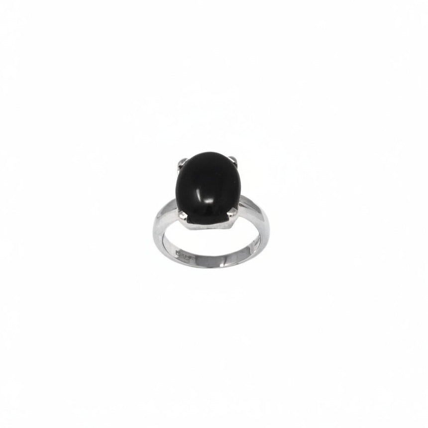 Silver ring with a black Onyx gemstone on a white background