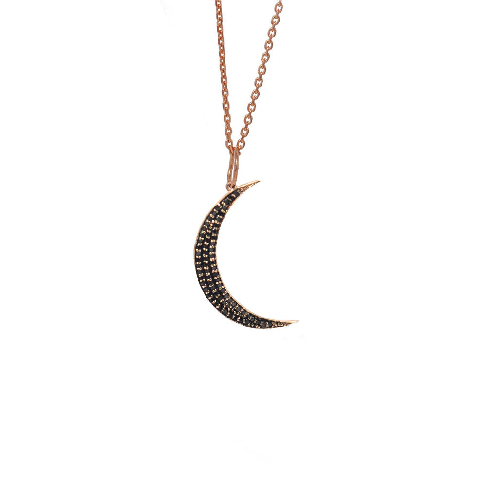 Women's 14k gold small crescent moon pendant with hand-set black diamonds - Best moon jewelry by Versani SoHo