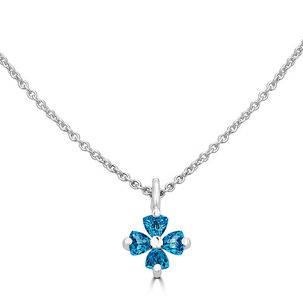 Versani NY Women's Large Statement Flower Pendant in Sterling Silver with Blue Topaz and Garnet gemstones.